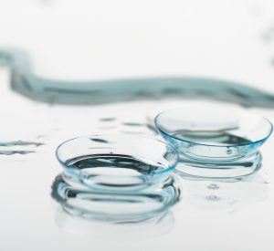 Two contact lenses with reflections